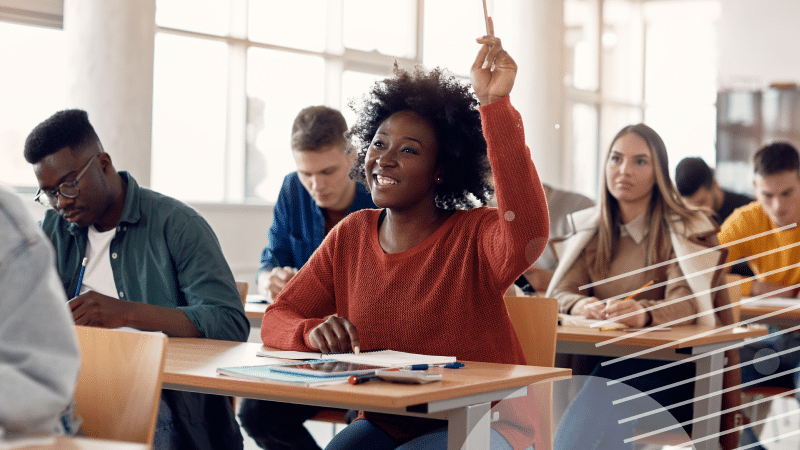 a student in class raising hand