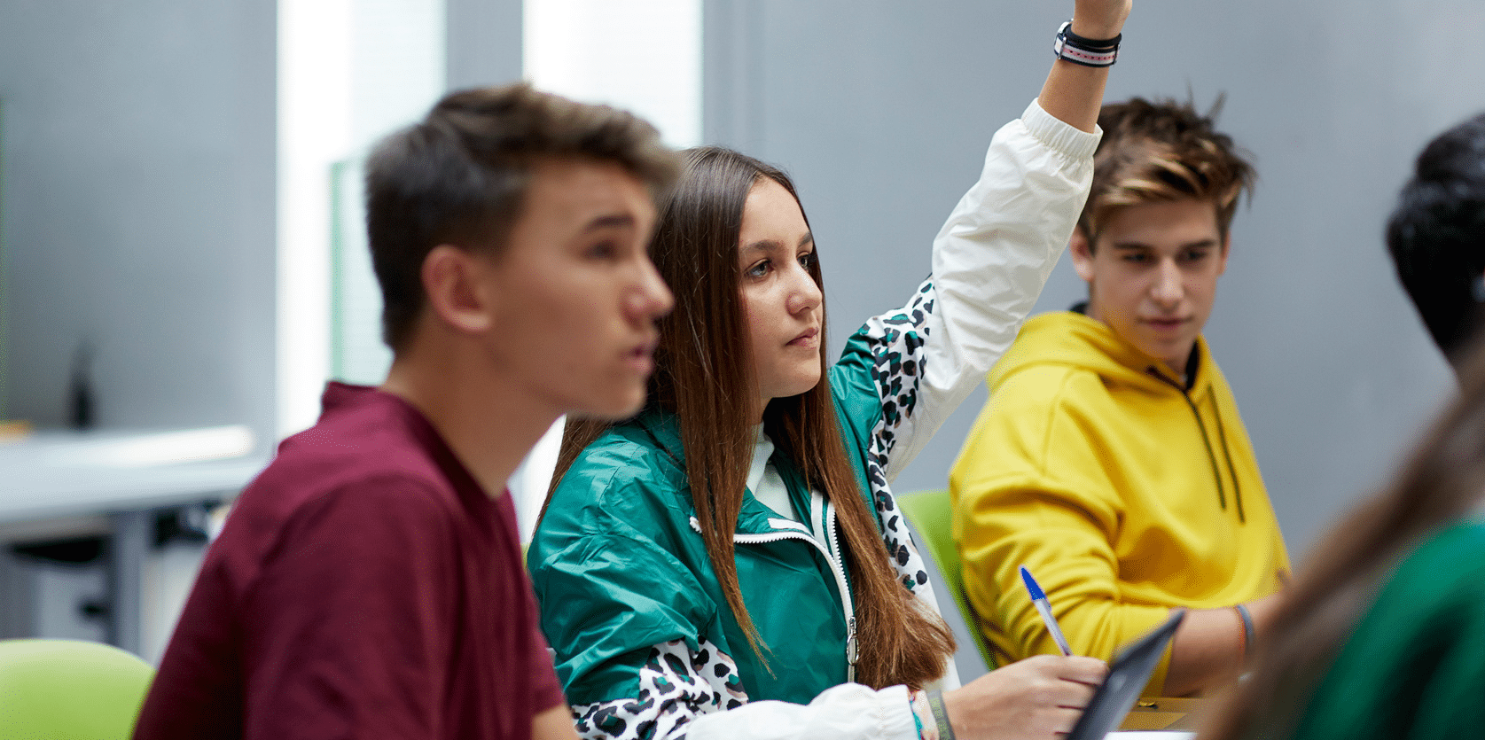 Teenage students participating in the class